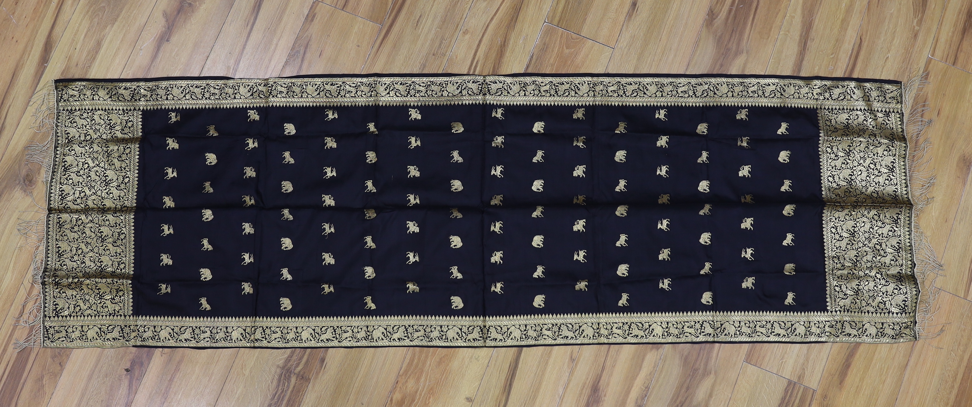 A gold thread Indian embroidered stole, 184 x 57cm